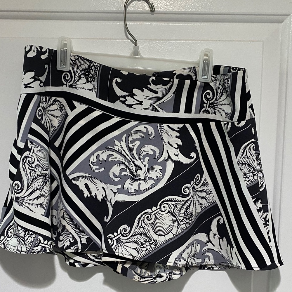 Patterned mini shirt with shorts underneath